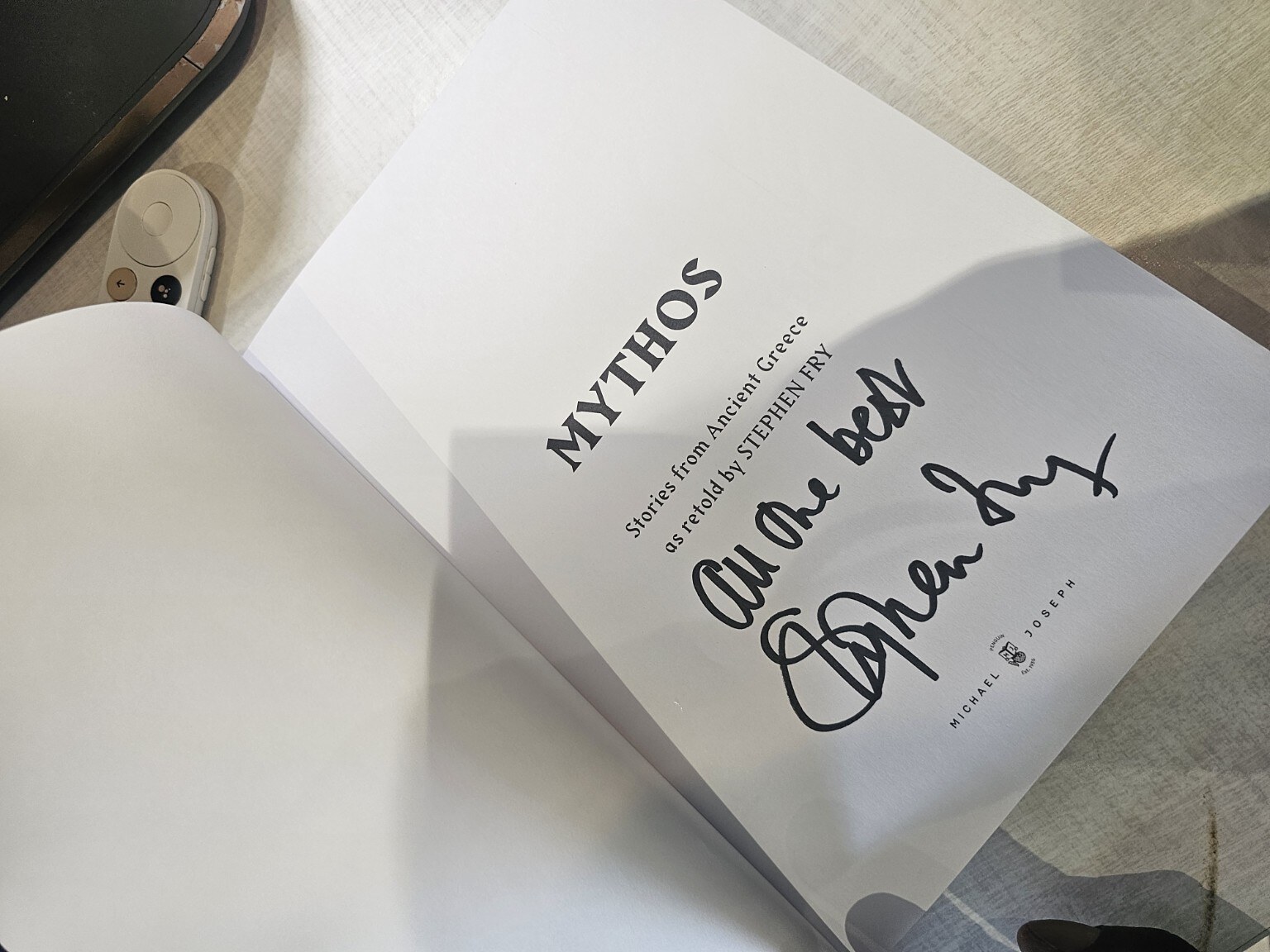 Parcel containing the signed illustrated Mythos sent by Stephen Fry's office to Common Ground